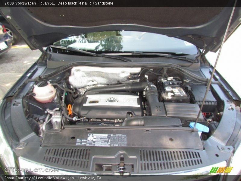Deep Black Metallic / Sandstone 2009 Volkswagen Tiguan SE