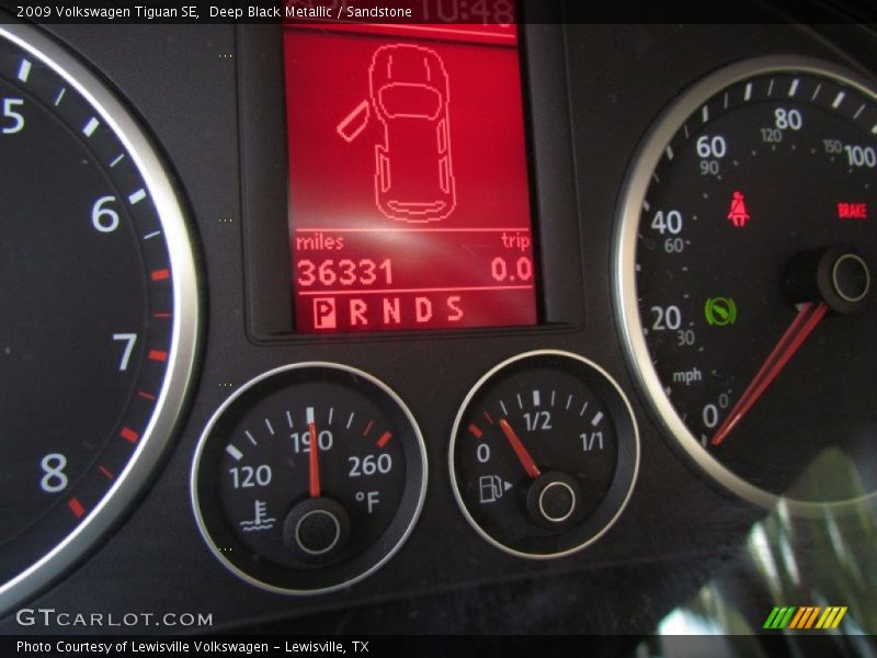 Deep Black Metallic / Sandstone 2009 Volkswagen Tiguan SE
