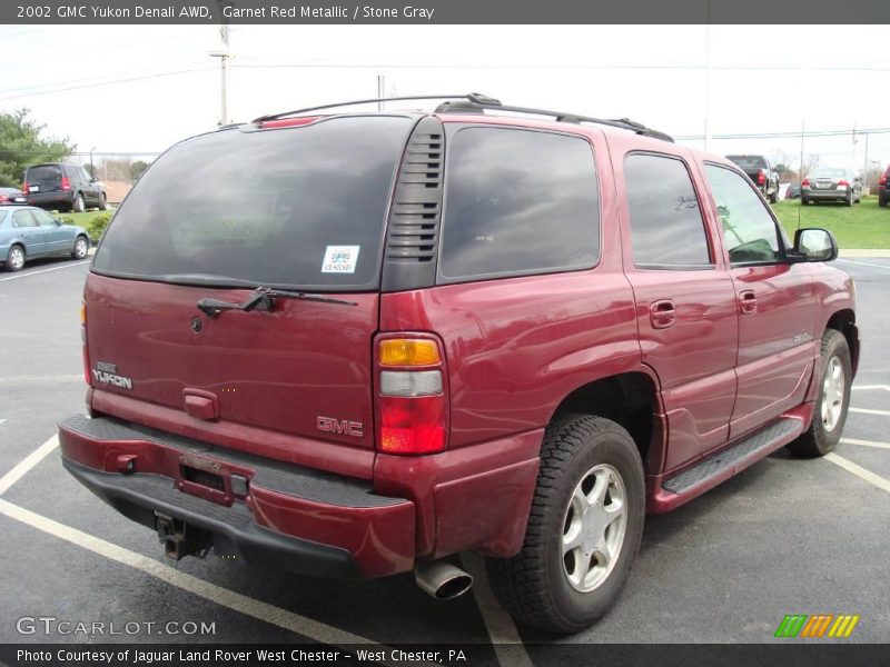Garnet Red Metallic / Stone Gray 2002 GMC Yukon Denali AWD