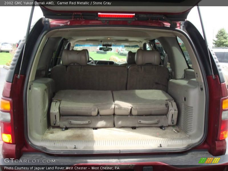 Garnet Red Metallic / Stone Gray 2002 GMC Yukon Denali AWD