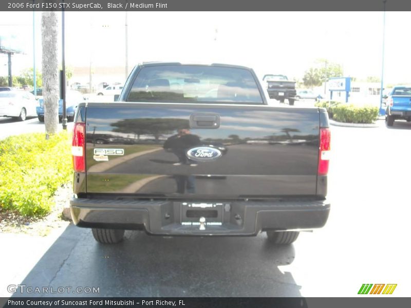 Black / Medium Flint 2006 Ford F150 STX SuperCab