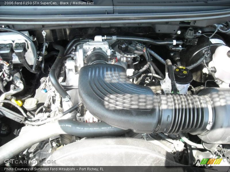Black / Medium Flint 2006 Ford F150 STX SuperCab