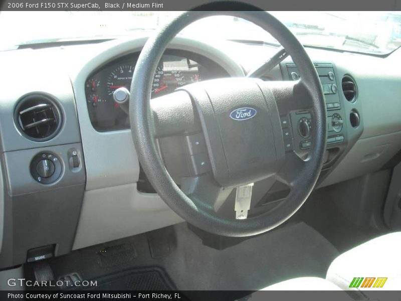 Black / Medium Flint 2006 Ford F150 STX SuperCab