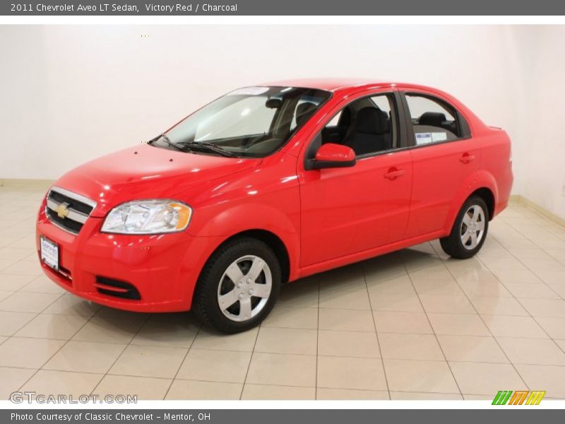 Victory Red / Charcoal 2011 Chevrolet Aveo LT Sedan