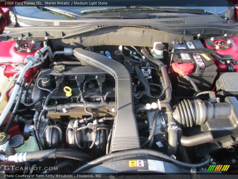 Merlot Metallic / Medium Light Stone 2006 Ford Fusion SEL