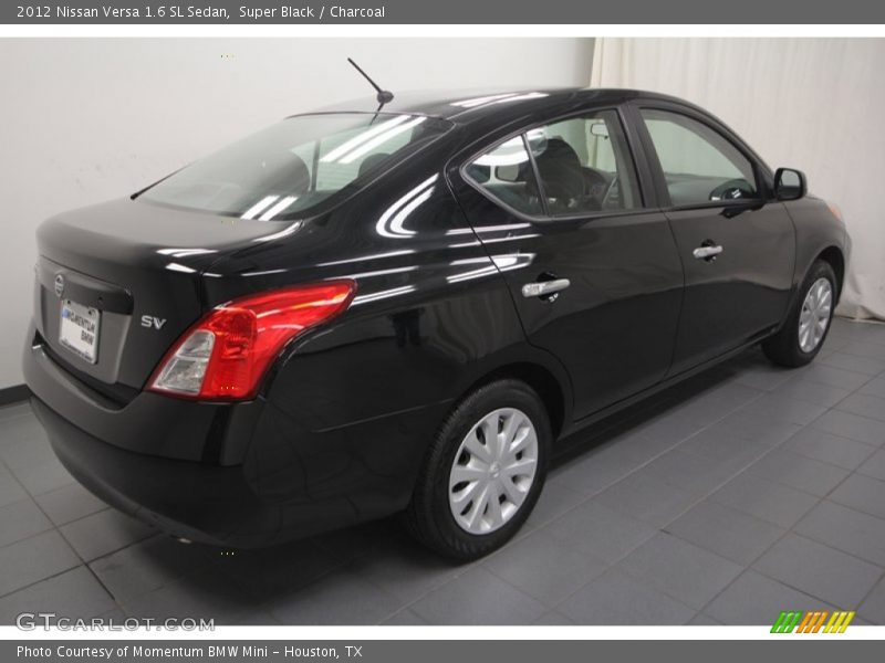 Super Black / Charcoal 2012 Nissan Versa 1.6 SL Sedan