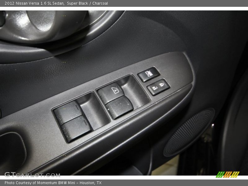 Super Black / Charcoal 2012 Nissan Versa 1.6 SL Sedan