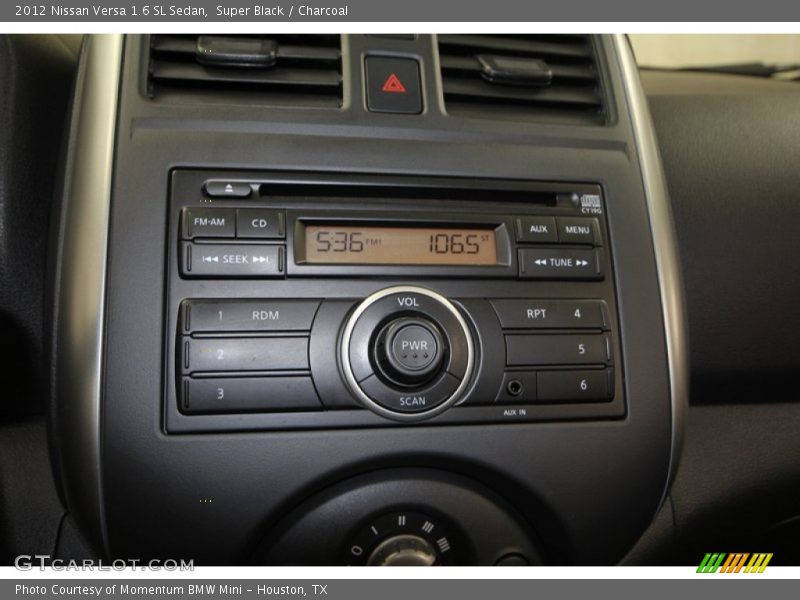 Super Black / Charcoal 2012 Nissan Versa 1.6 SL Sedan