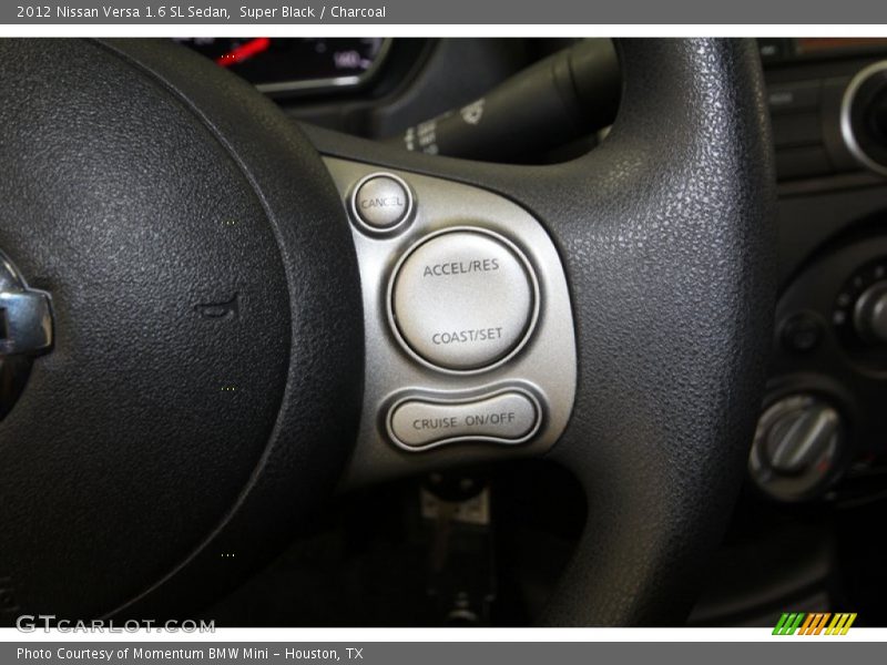 Super Black / Charcoal 2012 Nissan Versa 1.6 SL Sedan