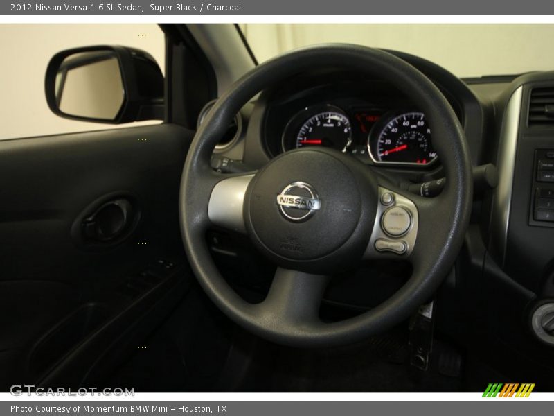 Super Black / Charcoal 2012 Nissan Versa 1.6 SL Sedan