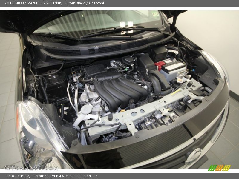 Super Black / Charcoal 2012 Nissan Versa 1.6 SL Sedan