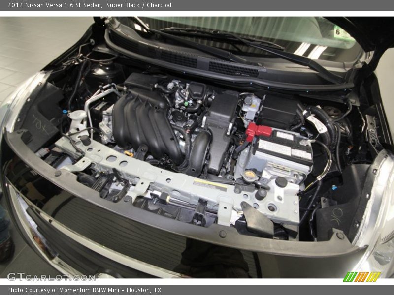 Super Black / Charcoal 2012 Nissan Versa 1.6 SL Sedan