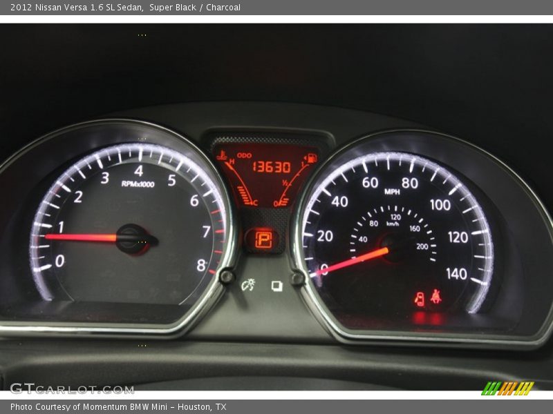 Super Black / Charcoal 2012 Nissan Versa 1.6 SL Sedan