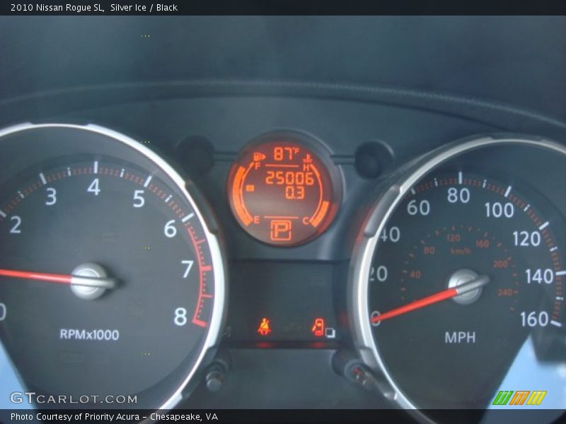 Silver Ice / Black 2010 Nissan Rogue SL
