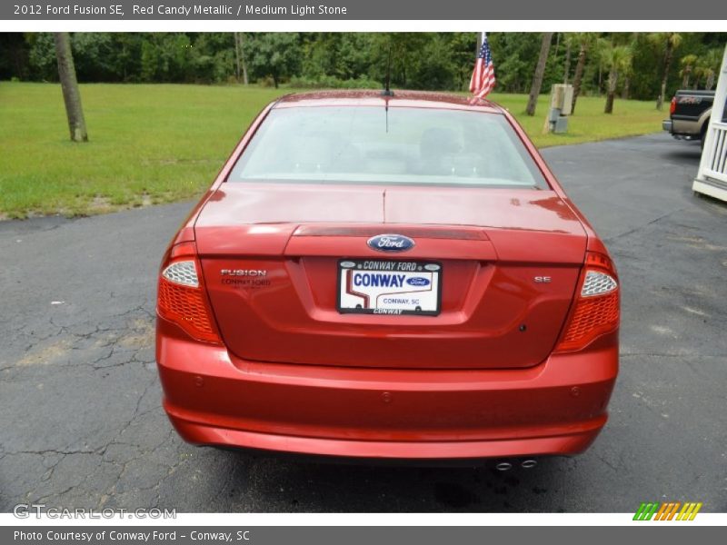 Red Candy Metallic / Medium Light Stone 2012 Ford Fusion SE