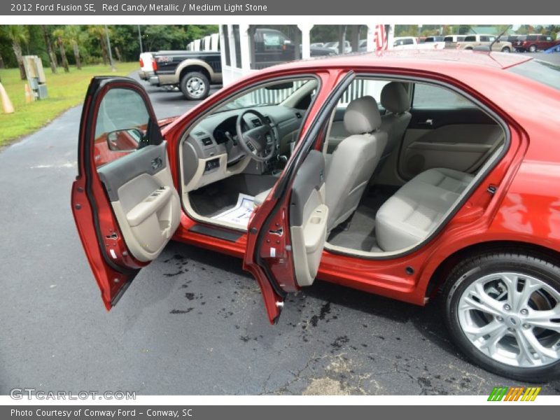 Red Candy Metallic / Medium Light Stone 2012 Ford Fusion SE
