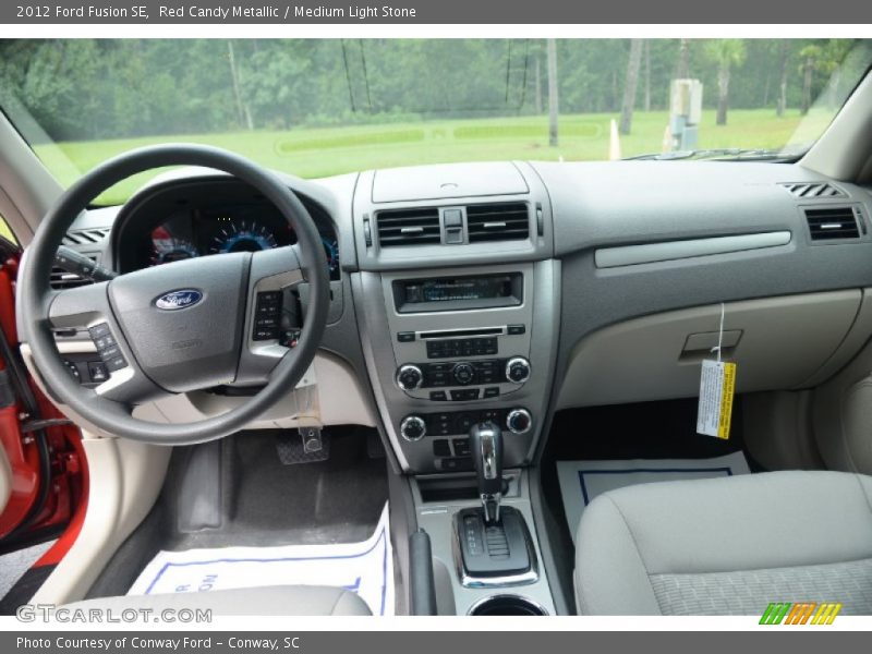 Red Candy Metallic / Medium Light Stone 2012 Ford Fusion SE