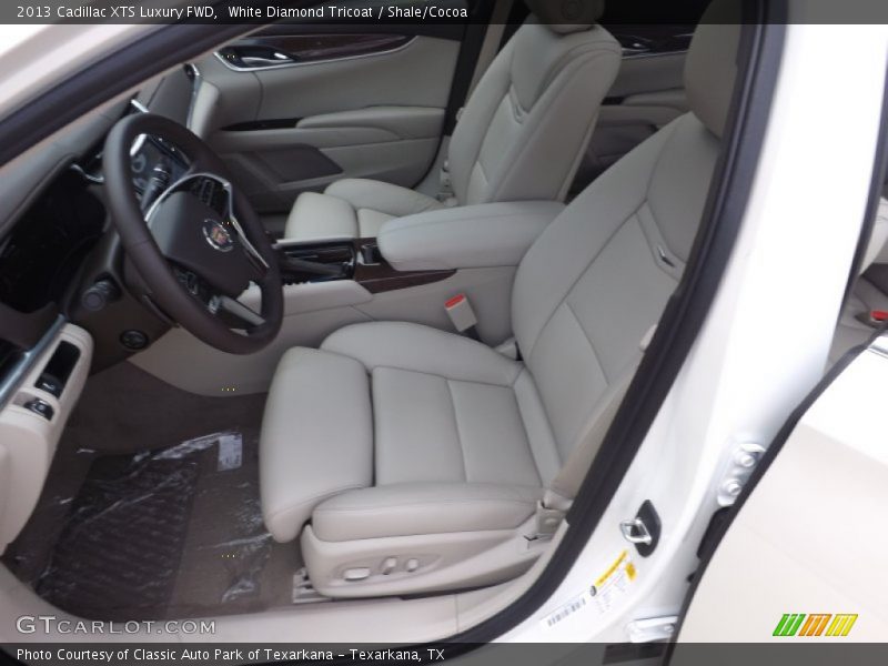 Front Seat of 2013 XTS Luxury FWD