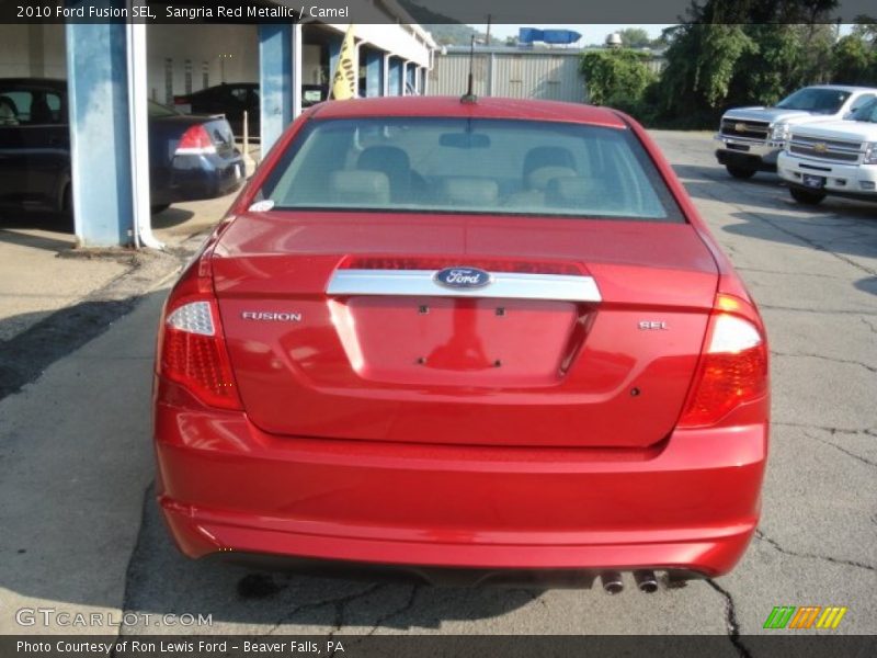 Sangria Red Metallic / Camel 2010 Ford Fusion SEL