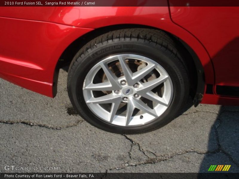Sangria Red Metallic / Camel 2010 Ford Fusion SEL