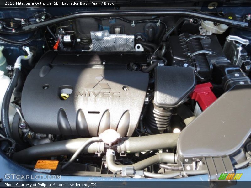 Labrador Black Pearl / Black 2010 Mitsubishi Outlander SE