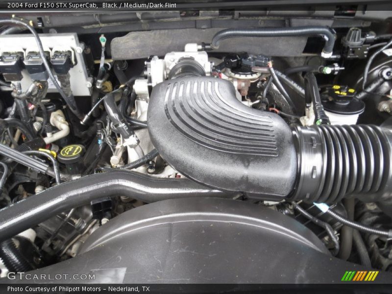 Black / Medium/Dark Flint 2004 Ford F150 STX SuperCab