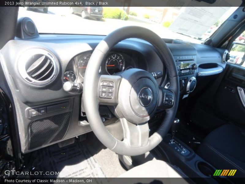 Black / Black 2013 Jeep Wrangler Unlimited Rubicon 4x4