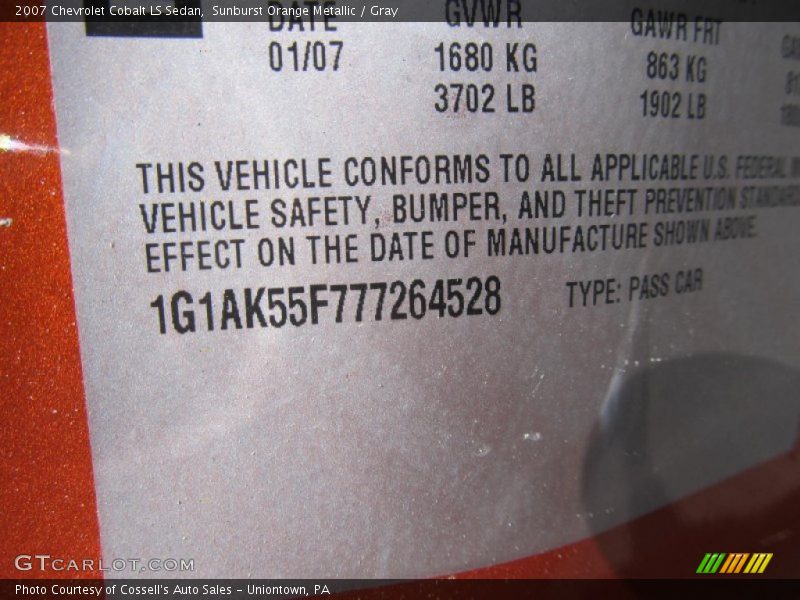 Sunburst Orange Metallic / Gray 2007 Chevrolet Cobalt LS Sedan