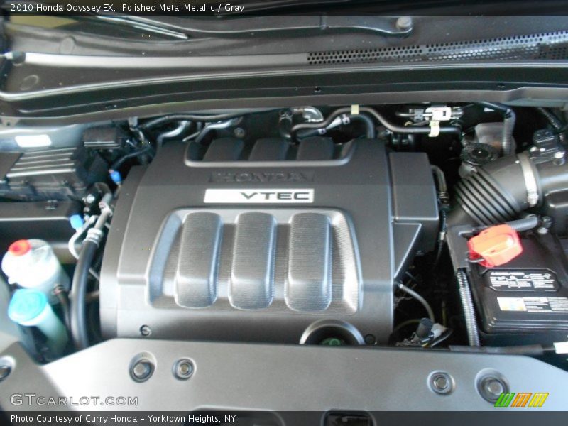Polished Metal Metallic / Gray 2010 Honda Odyssey EX