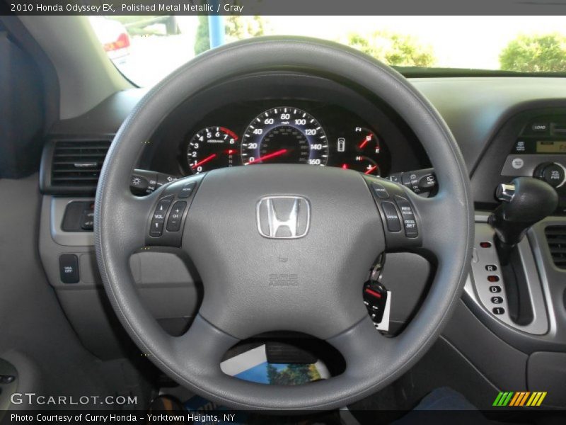 Polished Metal Metallic / Gray 2010 Honda Odyssey EX