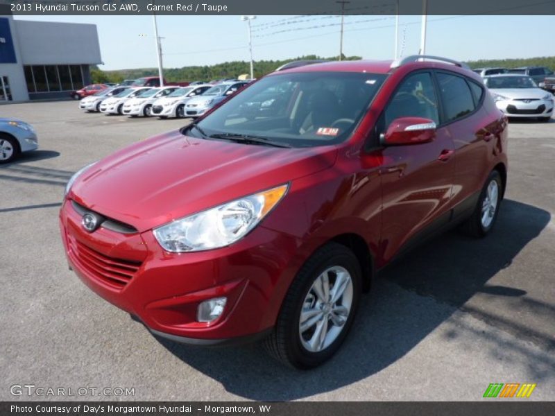 Garnet Red / Taupe 2013 Hyundai Tucson GLS AWD