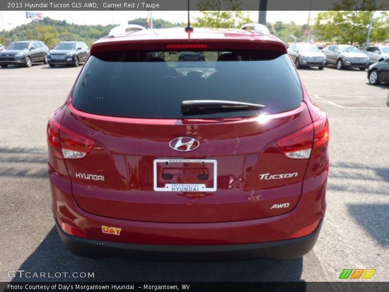 Garnet Red / Taupe 2013 Hyundai Tucson GLS AWD