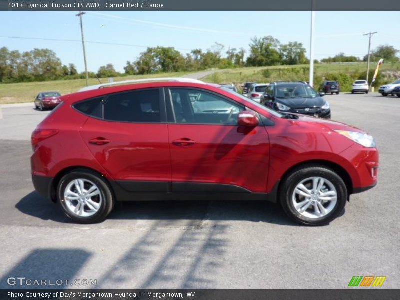 Garnet Red / Taupe 2013 Hyundai Tucson GLS AWD