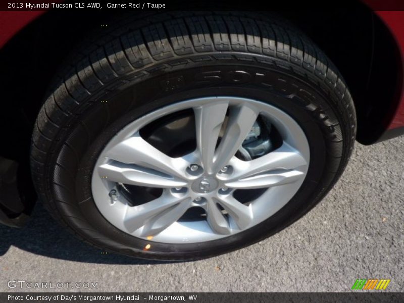 Garnet Red / Taupe 2013 Hyundai Tucson GLS AWD