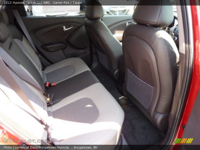 Garnet Red / Taupe 2013 Hyundai Tucson GLS AWD