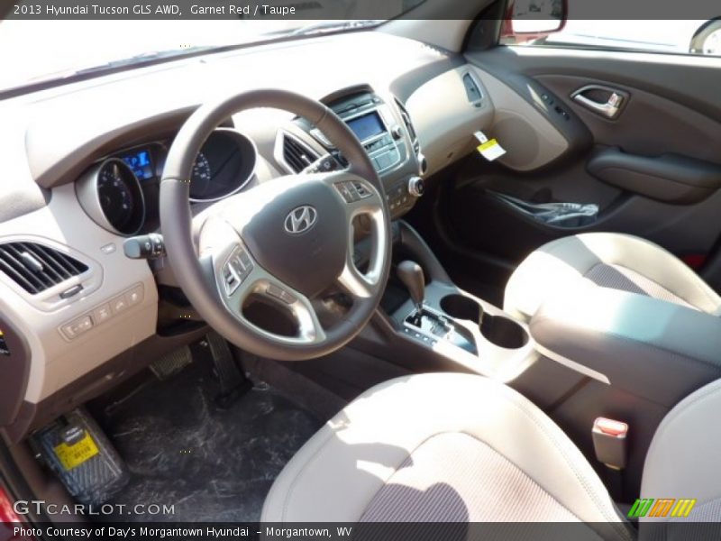 Garnet Red / Taupe 2013 Hyundai Tucson GLS AWD