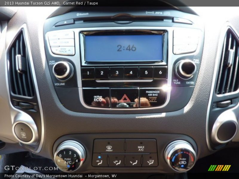 Garnet Red / Taupe 2013 Hyundai Tucson GLS AWD
