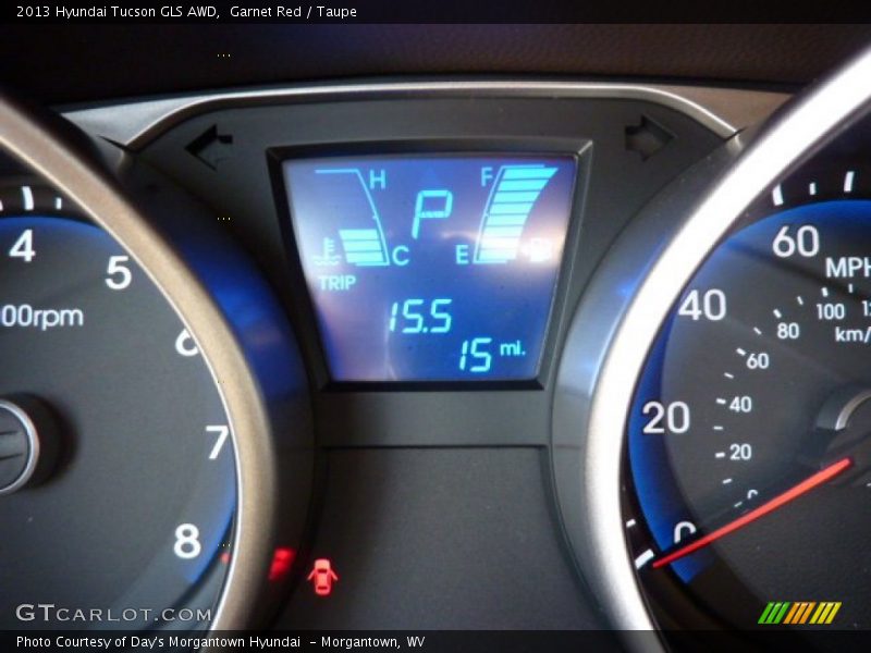 Garnet Red / Taupe 2013 Hyundai Tucson GLS AWD