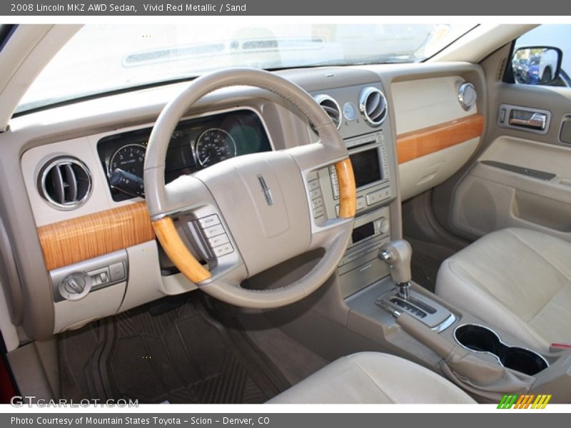 Vivid Red Metallic / Sand 2008 Lincoln MKZ AWD Sedan
