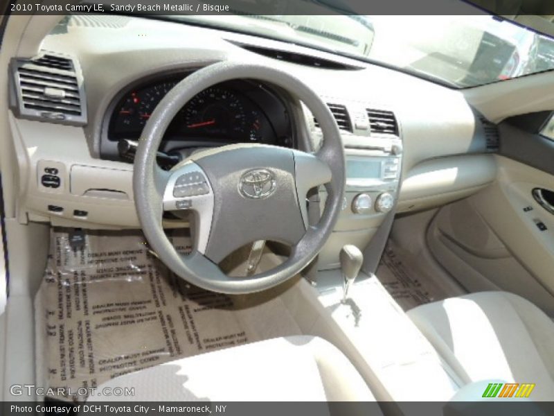 Sandy Beach Metallic / Bisque 2010 Toyota Camry LE