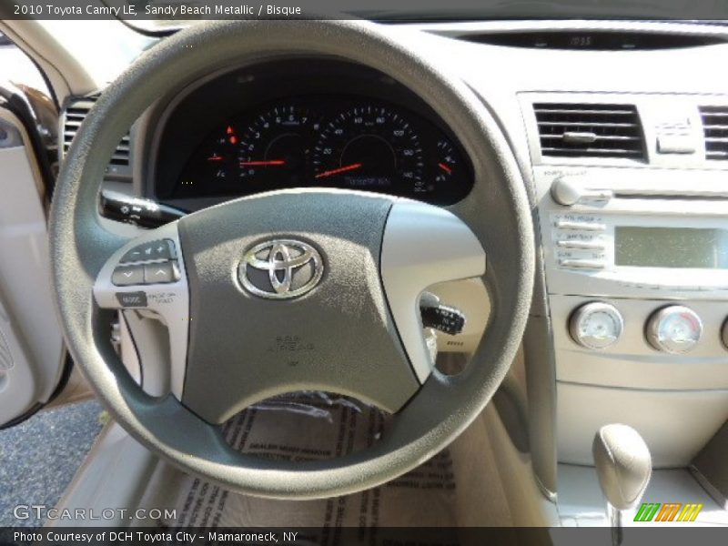 Sandy Beach Metallic / Bisque 2010 Toyota Camry LE