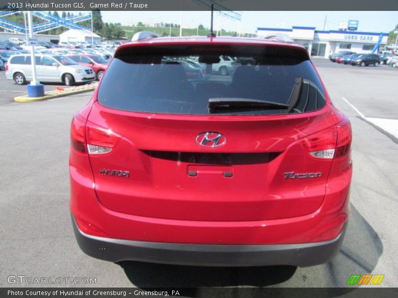 Garnet Red / Taupe 2013 Hyundai Tucson GLS