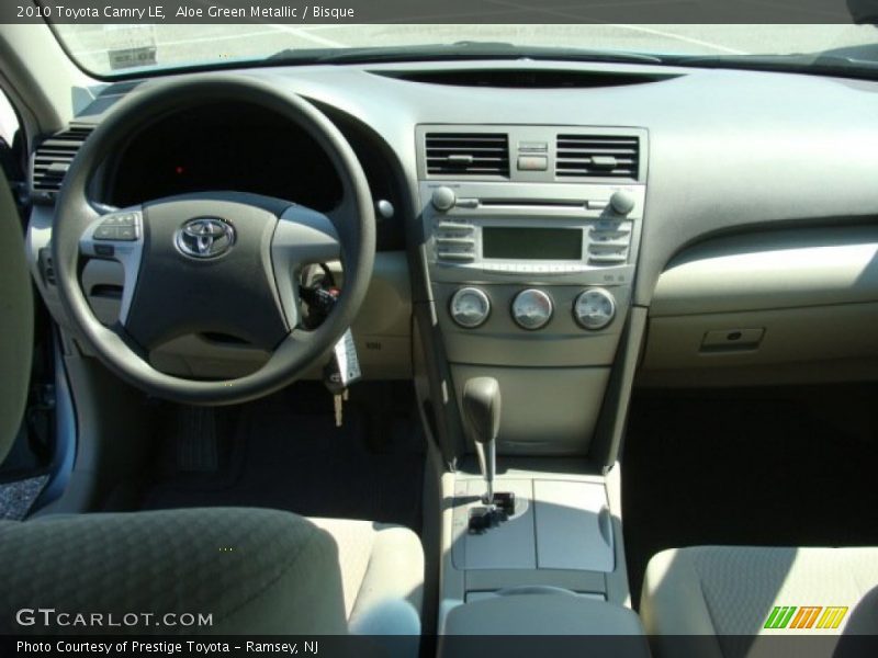Aloe Green Metallic / Bisque 2010 Toyota Camry LE
