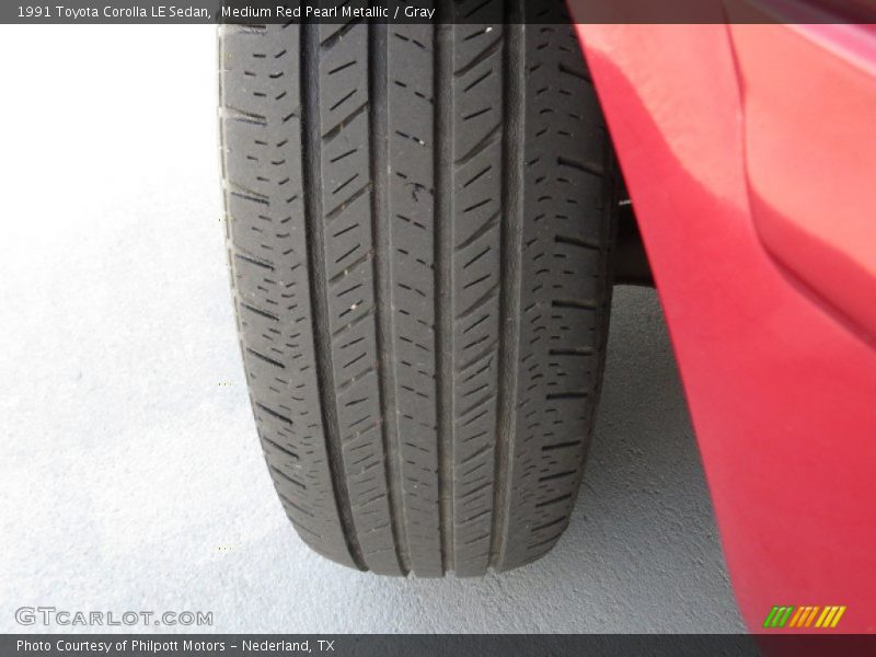 Medium Red Pearl Metallic / Gray 1991 Toyota Corolla LE Sedan