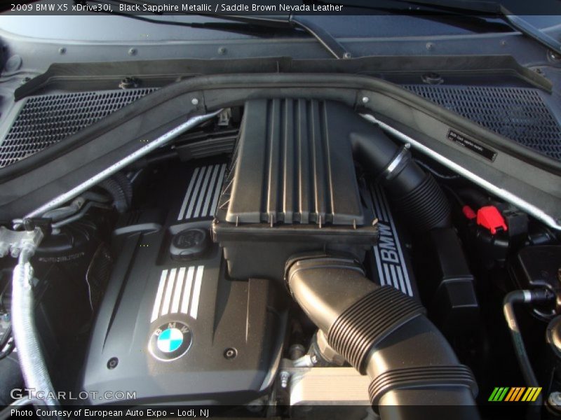 Black Sapphire Metallic / Saddle Brown Nevada Leather 2009 BMW X5 xDrive30i