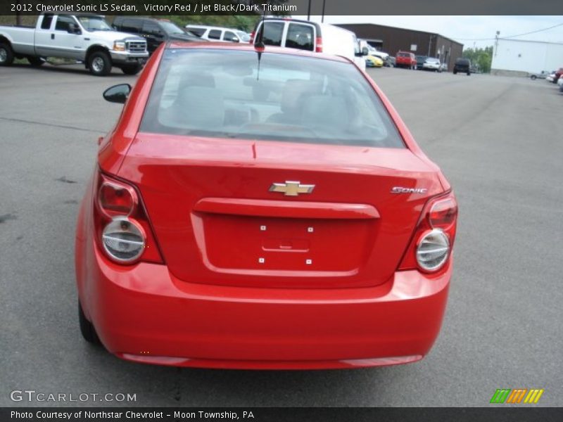 Victory Red / Jet Black/Dark Titanium 2012 Chevrolet Sonic LS Sedan