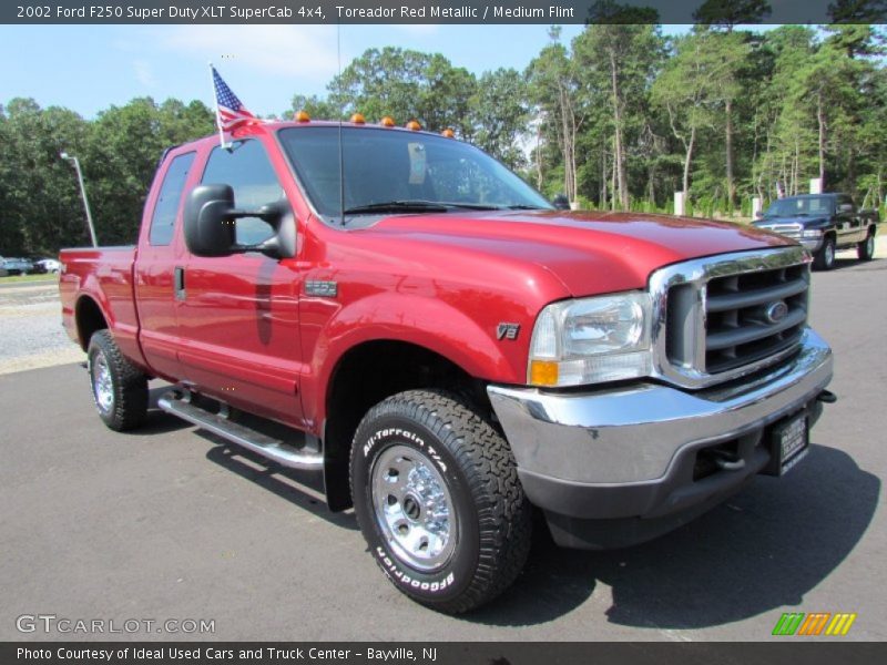 Front 3/4 View of 2002 F250 Super Duty XLT SuperCab 4x4