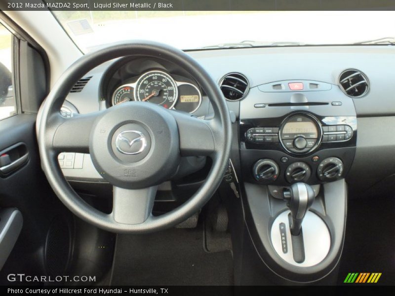 Dashboard of 2012 MAZDA2 Sport