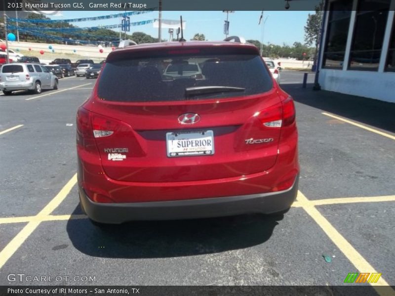 Garnet Red / Taupe 2013 Hyundai Tucson GLS