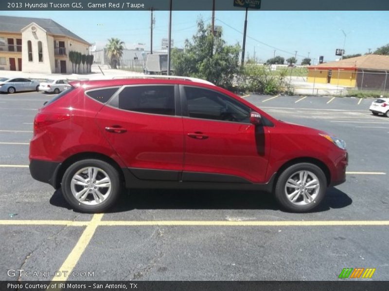 Garnet Red / Taupe 2013 Hyundai Tucson GLS